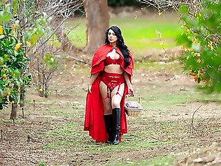 Kleio Valentien spices up a classic fairy tale, playing the Big Bad Wolf in a steamy encounter with a naughty shemale Red Riding Hood.